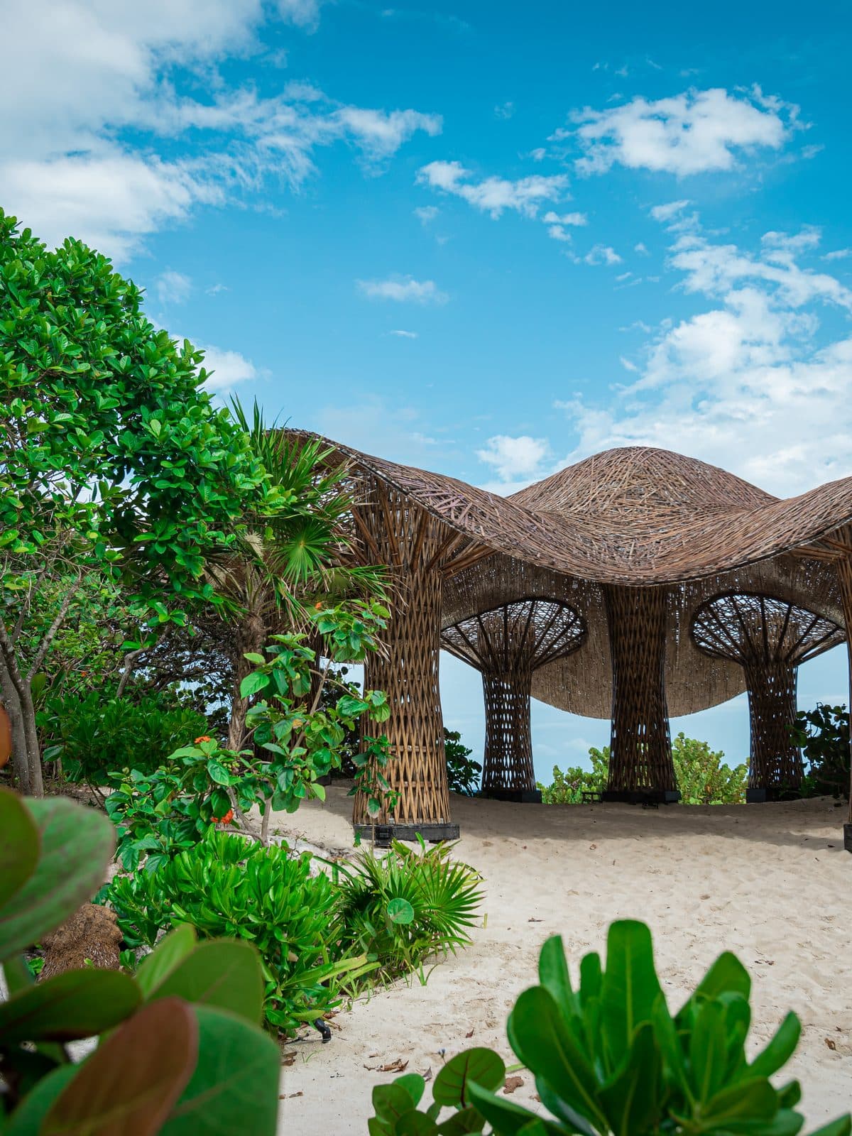 Sculptural beach pavilions at Palmaïa